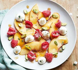 Peach & raspberry fruit salad with mascarpone